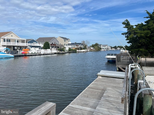 view of dock featuring a water view