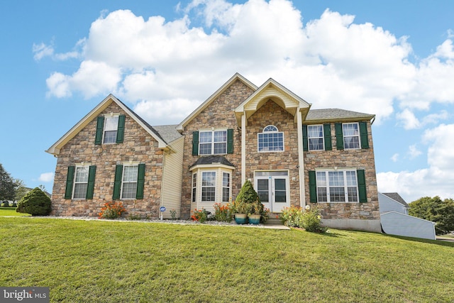 view of front of house with a front lawn