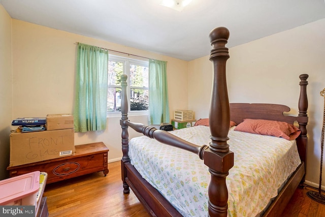 bedroom featuring hardwood / wood-style flooring