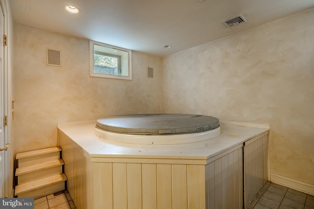 bathroom featuring tile patterned flooring