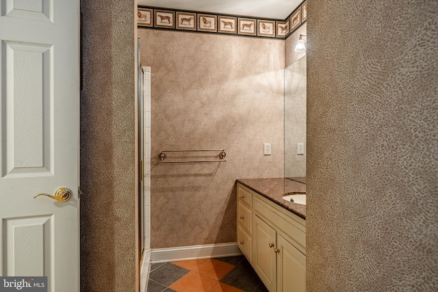 bathroom featuring vanity and tile patterned floors