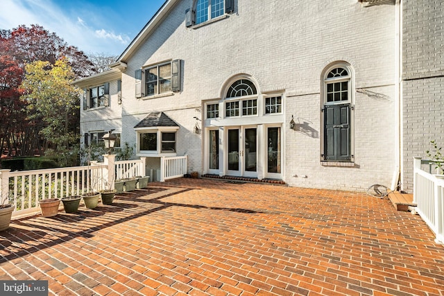 back of house with french doors