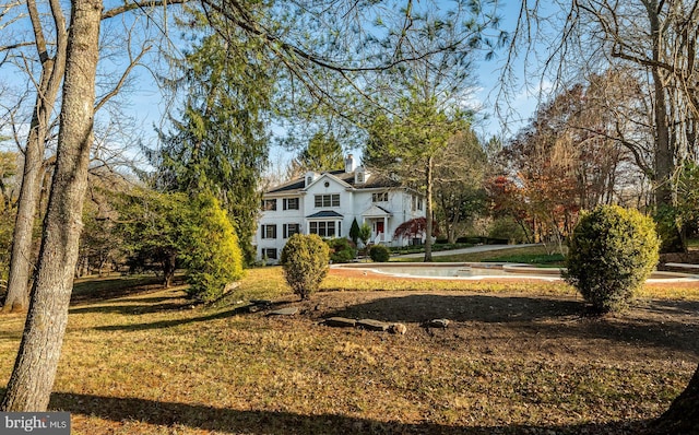 exterior space with a front yard