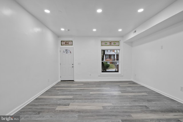 empty room with light hardwood / wood-style floors