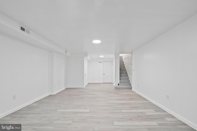 unfurnished living room with light hardwood / wood-style floors