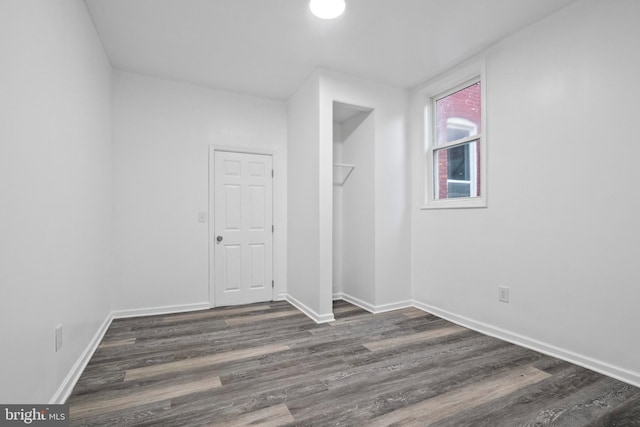 bonus room featuring dark hardwood / wood-style floors