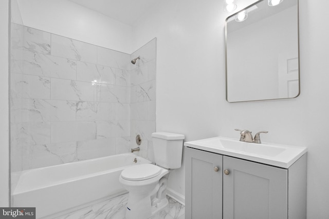 full bathroom with tiled shower / bath, toilet, and vanity