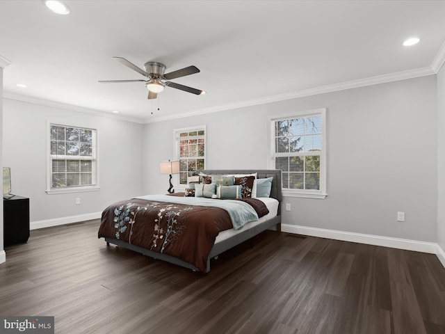 bedroom with ceiling fan, crown molding, and dark hardwood / wood-style floors