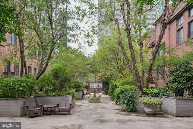 view of home's community with a patio