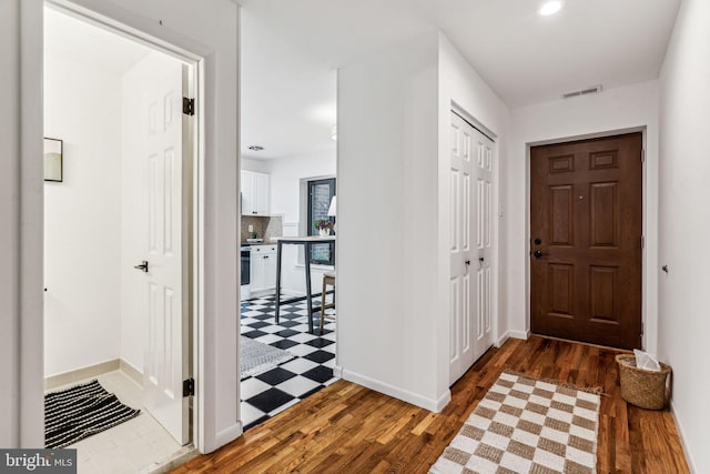 entrance foyer with dark wood-type flooring