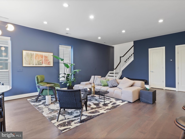 living room with dark wood-type flooring