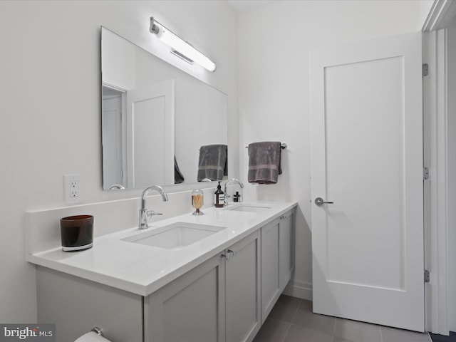 bathroom with vanity and tile patterned floors