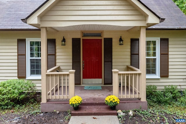 entrance to property with a porch