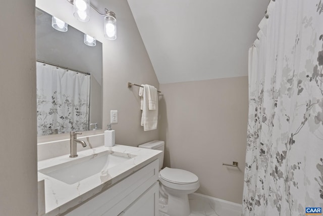 bathroom with vanity, toilet, lofted ceiling, and a shower with curtain