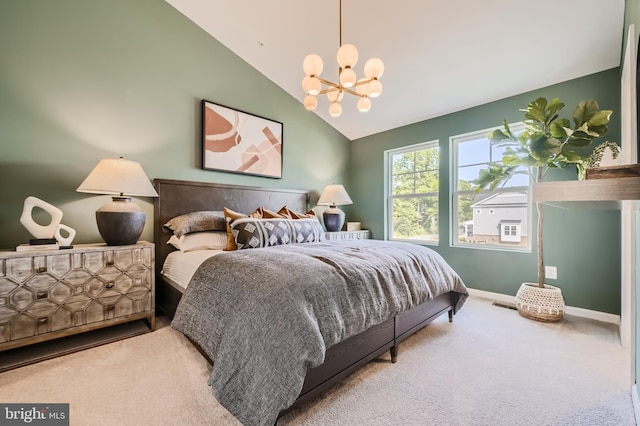 carpeted bedroom featuring a notable chandelier and high vaulted ceiling