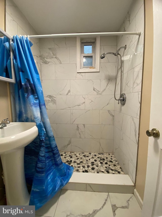 bathroom featuring walk in shower