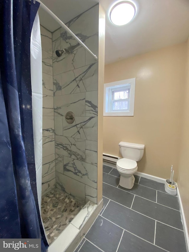 bathroom featuring a baseboard heating unit, tile patterned flooring, walk in shower, and toilet