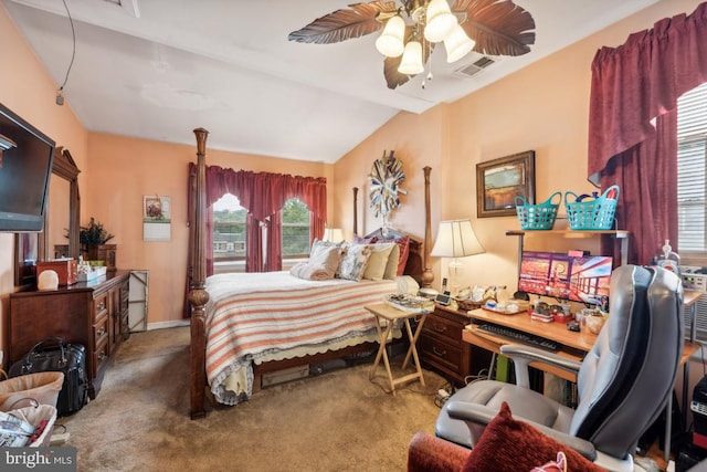 carpeted bedroom with vaulted ceiling and ceiling fan