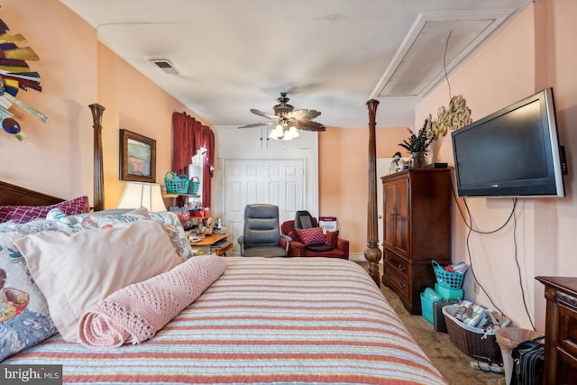 carpeted bedroom with ceiling fan and a closet