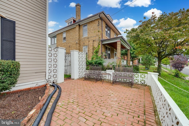 view of patio featuring covered porch