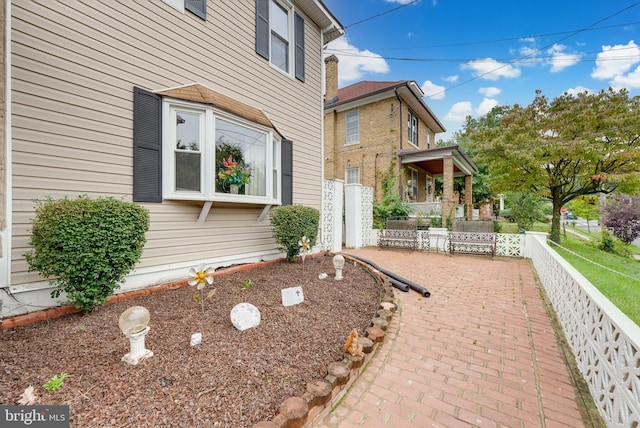 view of home's exterior with a patio