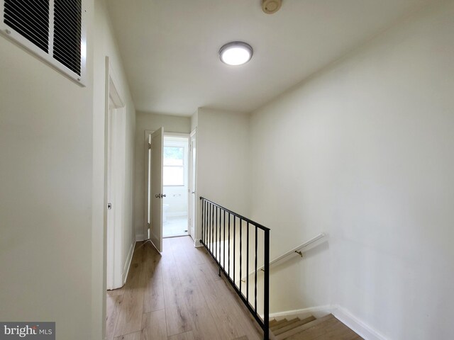 hallway featuring light hardwood / wood-style floors