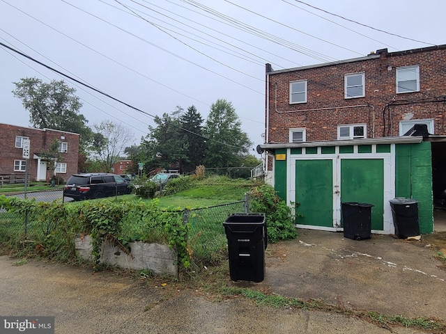 view of front facade with a shed