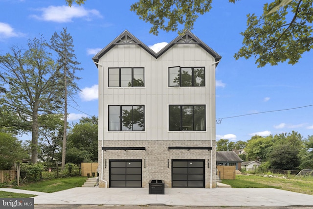 modern farmhouse style home with a garage