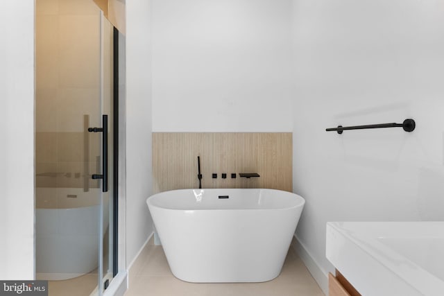 bathroom with plus walk in shower and tile patterned floors