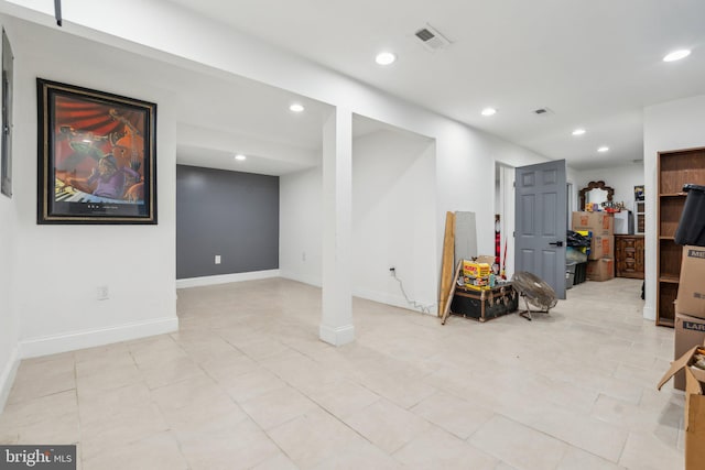 basement with light tile patterned floors