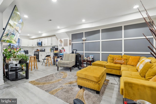 living room with light wood-type flooring