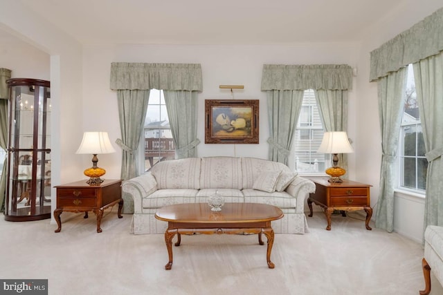 sitting room with carpet floors