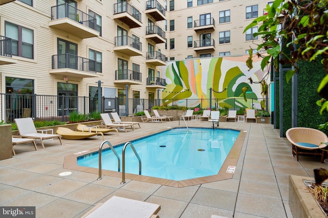 view of pool with a patio