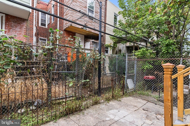 view of side of property featuring a balcony