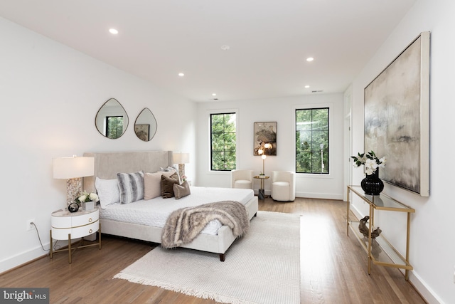 bedroom featuring hardwood / wood-style flooring