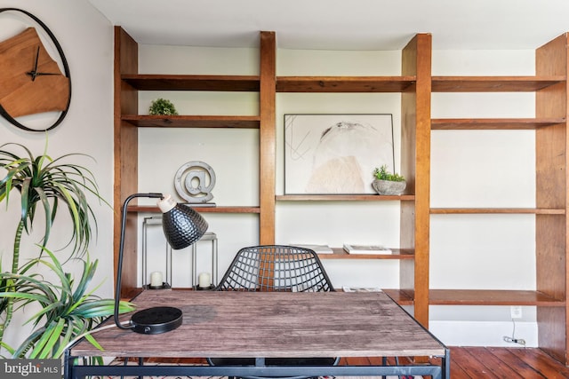 dining area featuring wood-type flooring