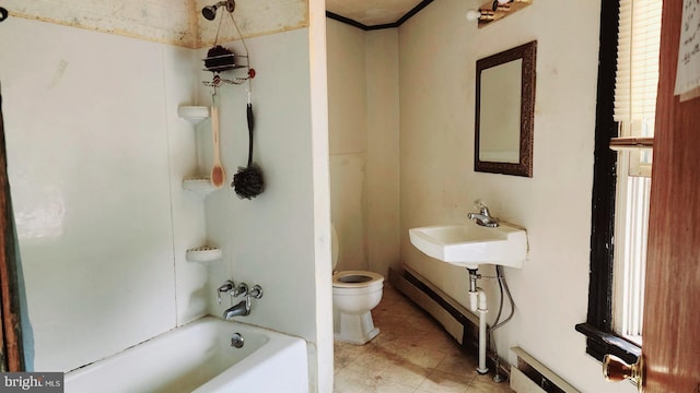 full bathroom with a baseboard heating unit, sink, shower / bath combination, and toilet