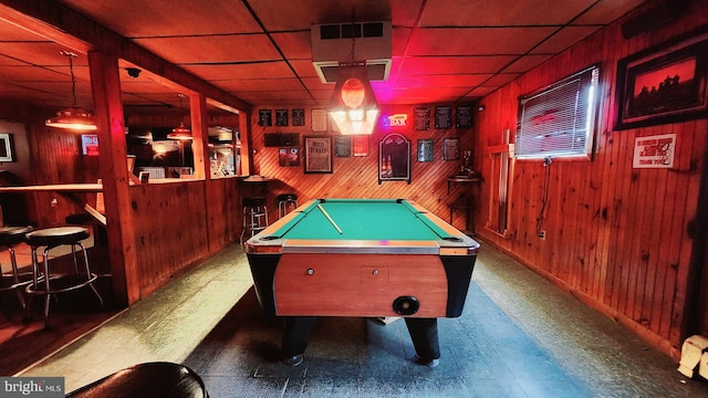 recreation room with wooden walls, billiards, and a paneled ceiling