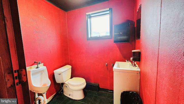 bathroom featuring tile patterned flooring, sink, and toilet