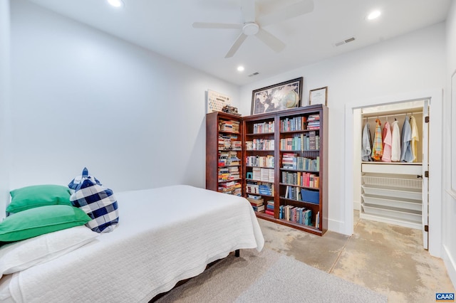 bedroom with ceiling fan and a closet