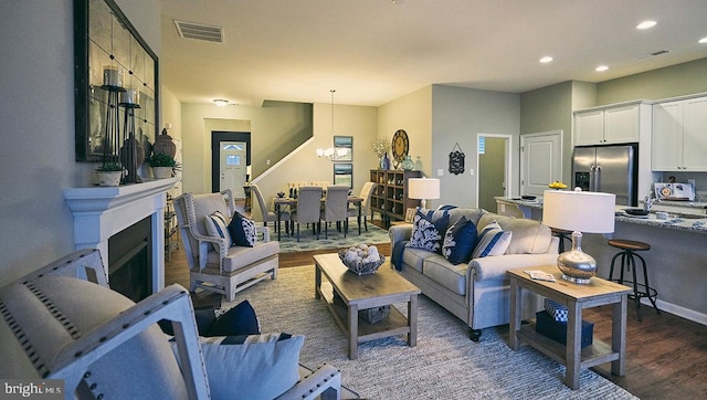 living room with dark wood-type flooring