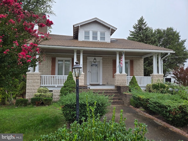 view of front of home featuring covered porch