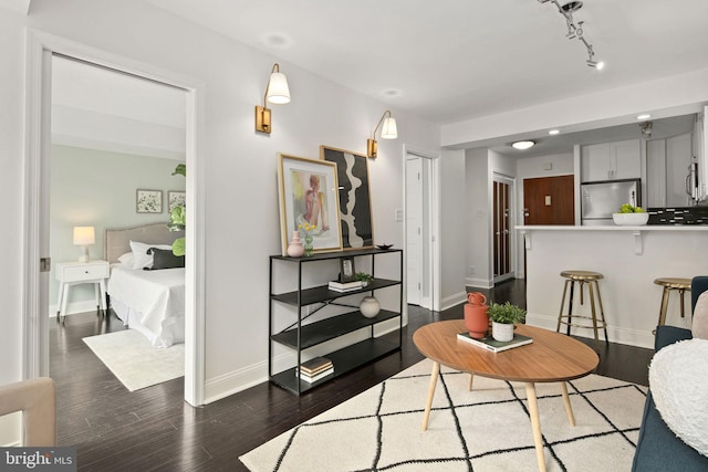 dining space with dark wood-type flooring