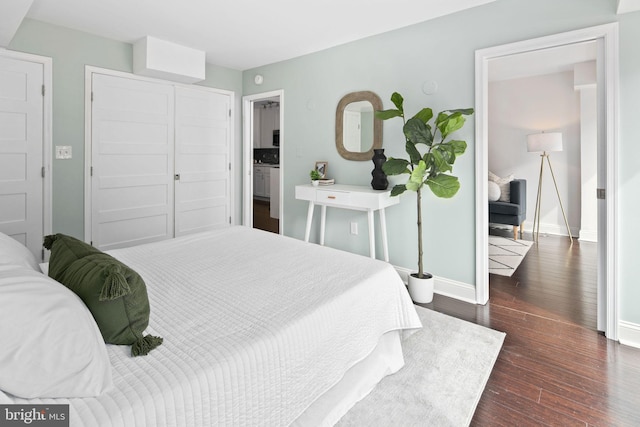 bedroom featuring dark hardwood / wood-style floors