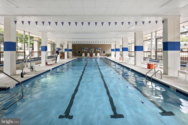 view of swimming pool with a patio