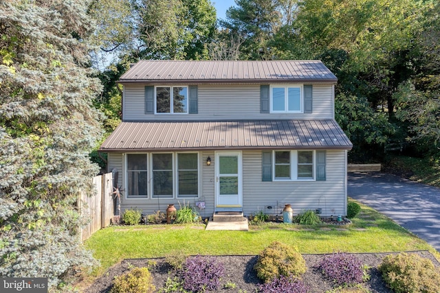 view of front property with a front lawn