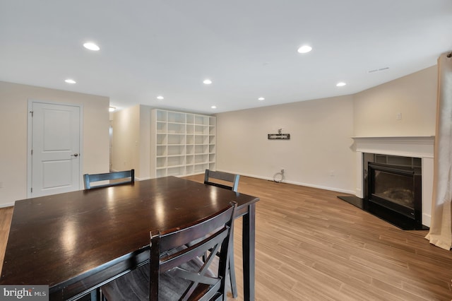 dining room featuring light hardwood / wood-style floors