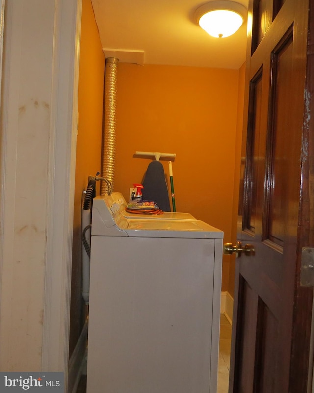 laundry area featuring separate washer and dryer