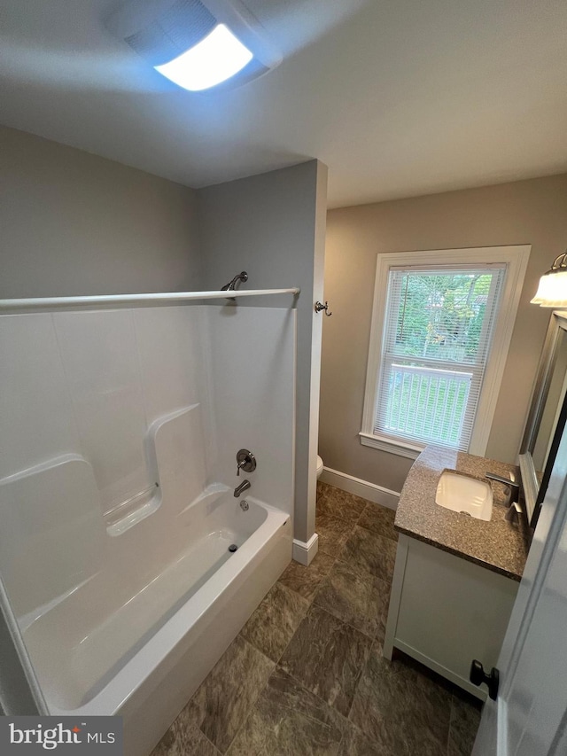 bathroom with vanity and shower / bath combination