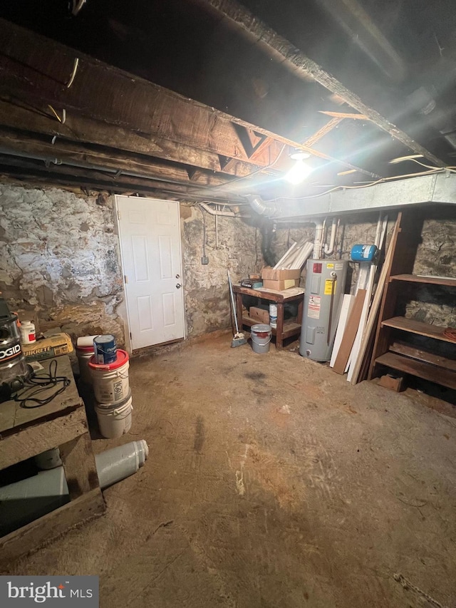 basement featuring electric water heater